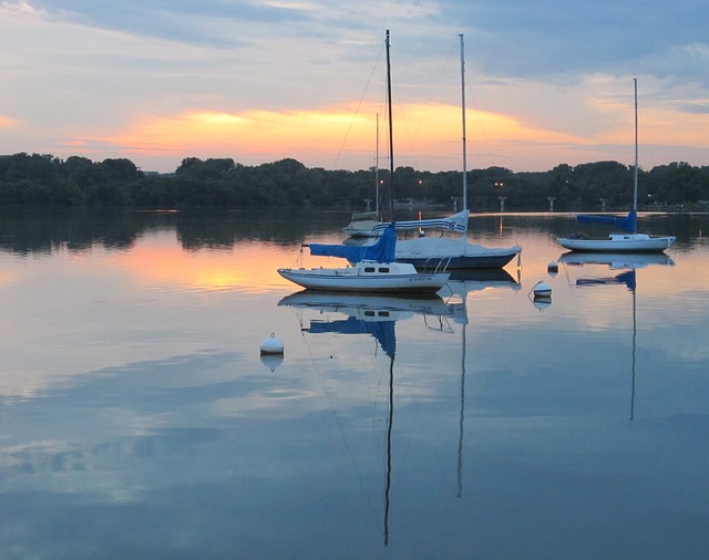 Boats on a lake at sunset