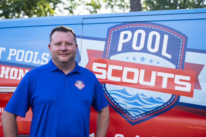 Scott Scheibe in front of Pool Scouts van