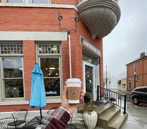 Person holding coffee cup at Espresso Air in Westerville, Ohio