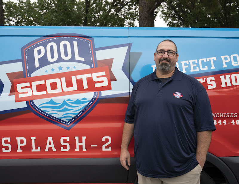 Pool Scouts owner Chris McNeillie in front of Pool Scouts van