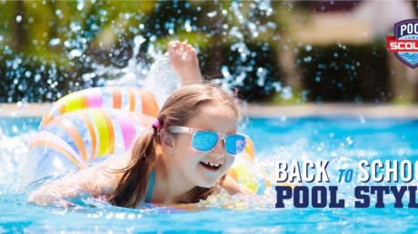 Little girl swimming in a pool