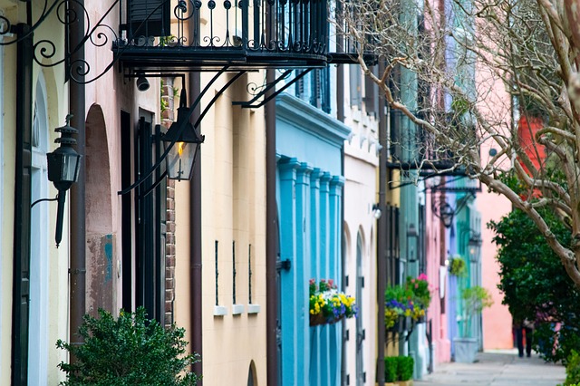 Sidewalk view of Rainbow Row houses in Charleston