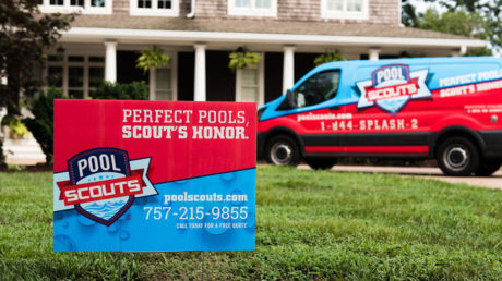 Pool Scouts yard sign with Pool Scouts van in background