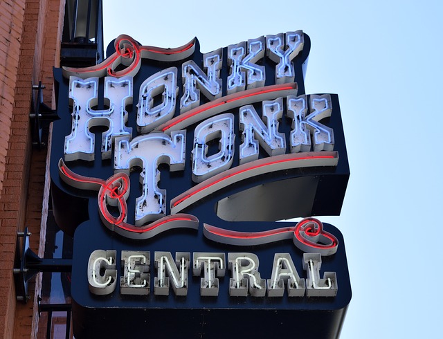 Neon sign that says Honky Tonk Central