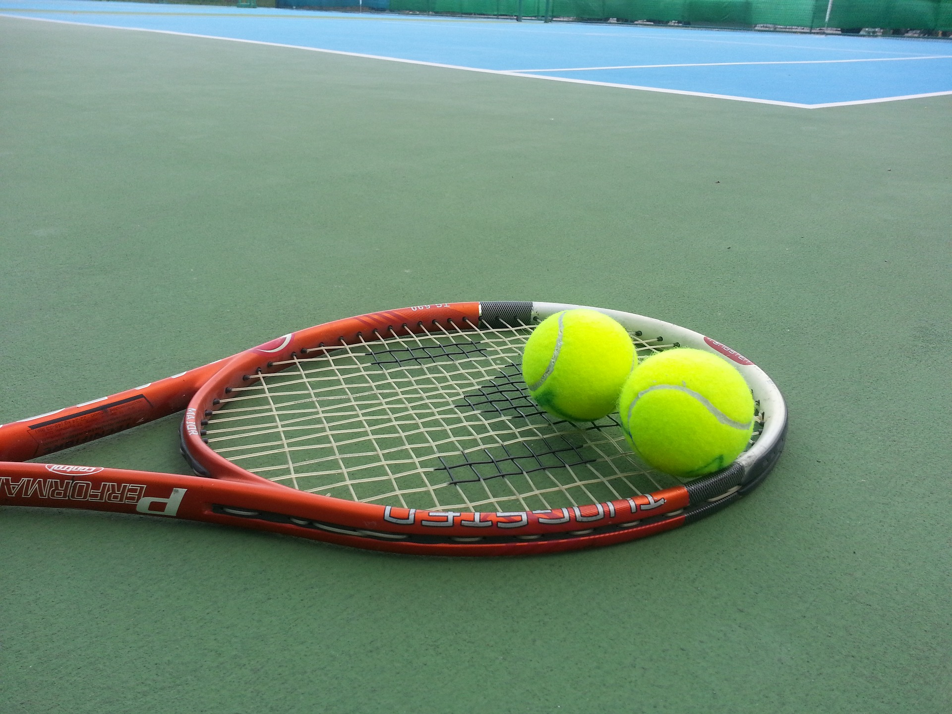 Tennis racquet and balls
