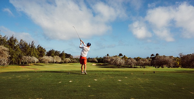 Man playing golf on a sunny day in The Tribute