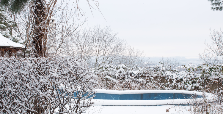 Snow covered pool from winter storm