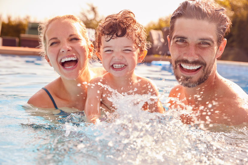 Family Laughing in a Clean Swimming Pool