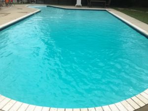 Clear, blue pool after a Pool Scouts green pool service