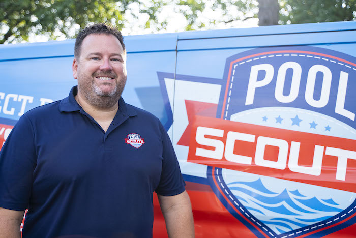 Pool Scouts Owner Jeremy Godfrey in front of Pool Scouts van