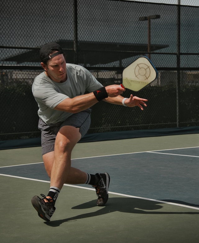 Man playing pickleball in Esplanade, FL