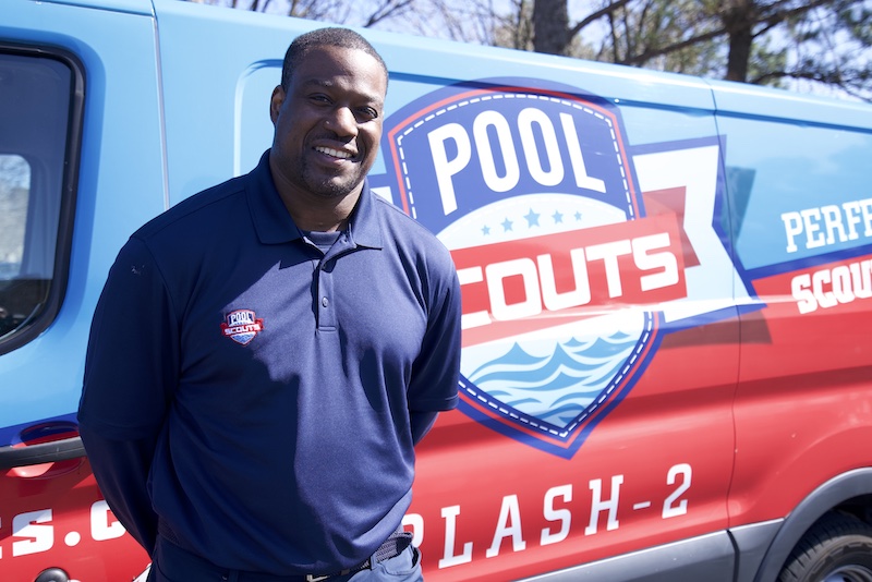 Pool Scouts owner Clarence Herry in front of Pool Scouts van