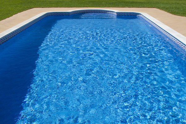 Swimming pool with a recently replaced vinyl liner