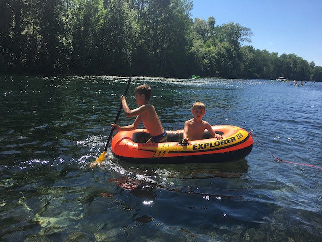 Kids on a tube in the Edisto River 