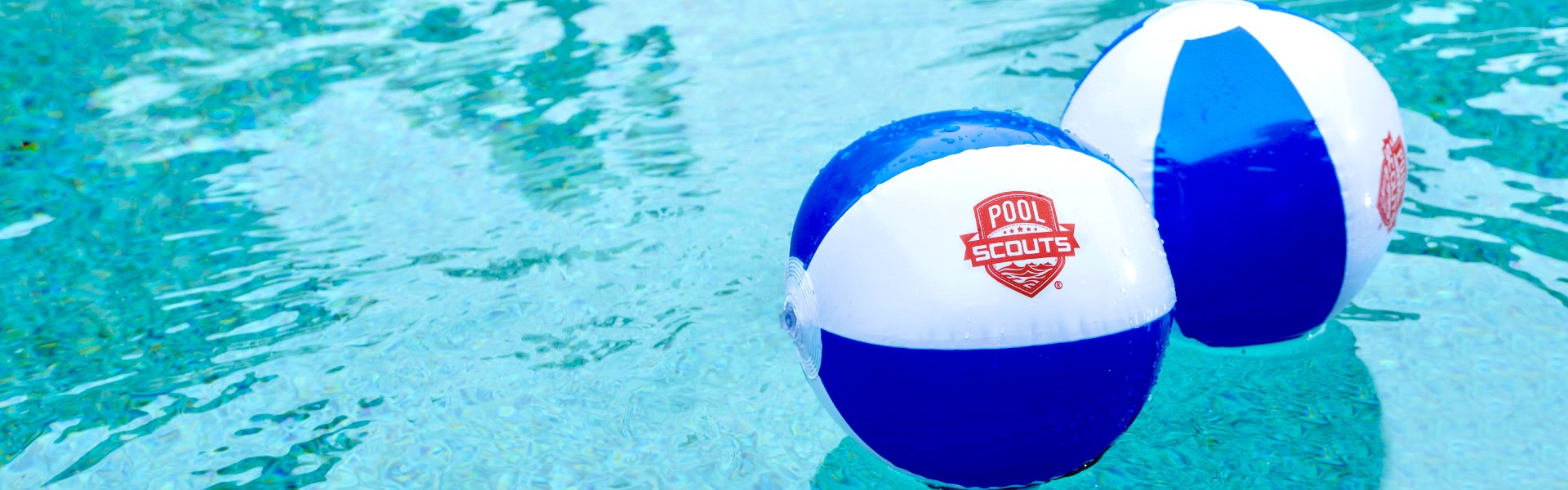floaty balls with pool scouts logo in clean pool