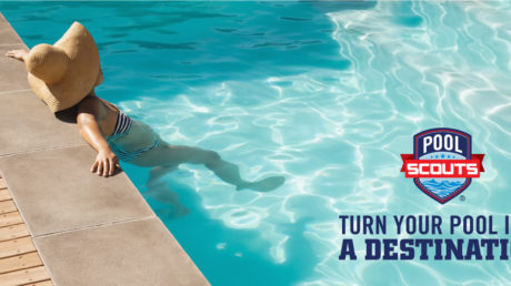 Woman relaxing on the edge of the pool