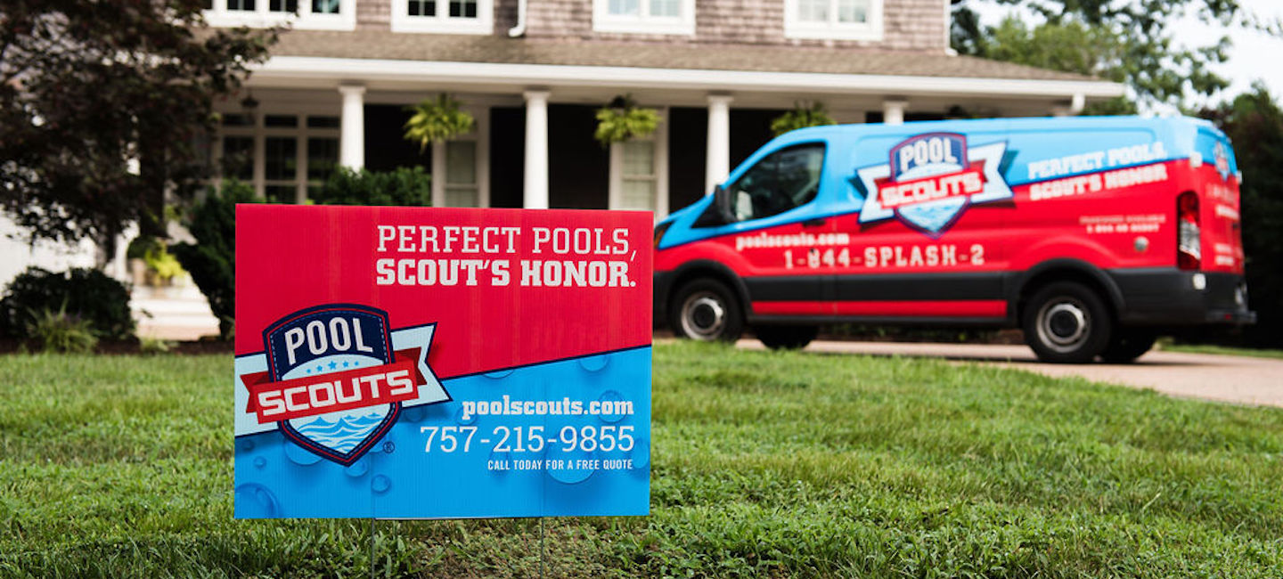 Pool Scouts yard sign with Pool Scouts van in background